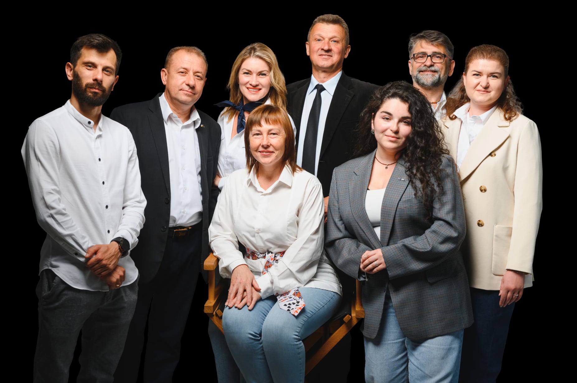 A group of seven people standing together.