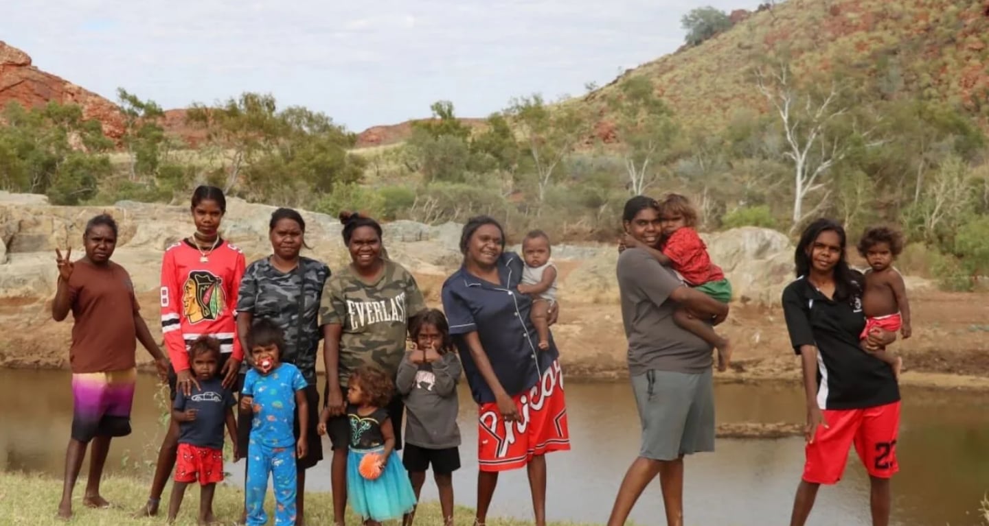Children and families from the SoundSmiles community gathered together by the river.